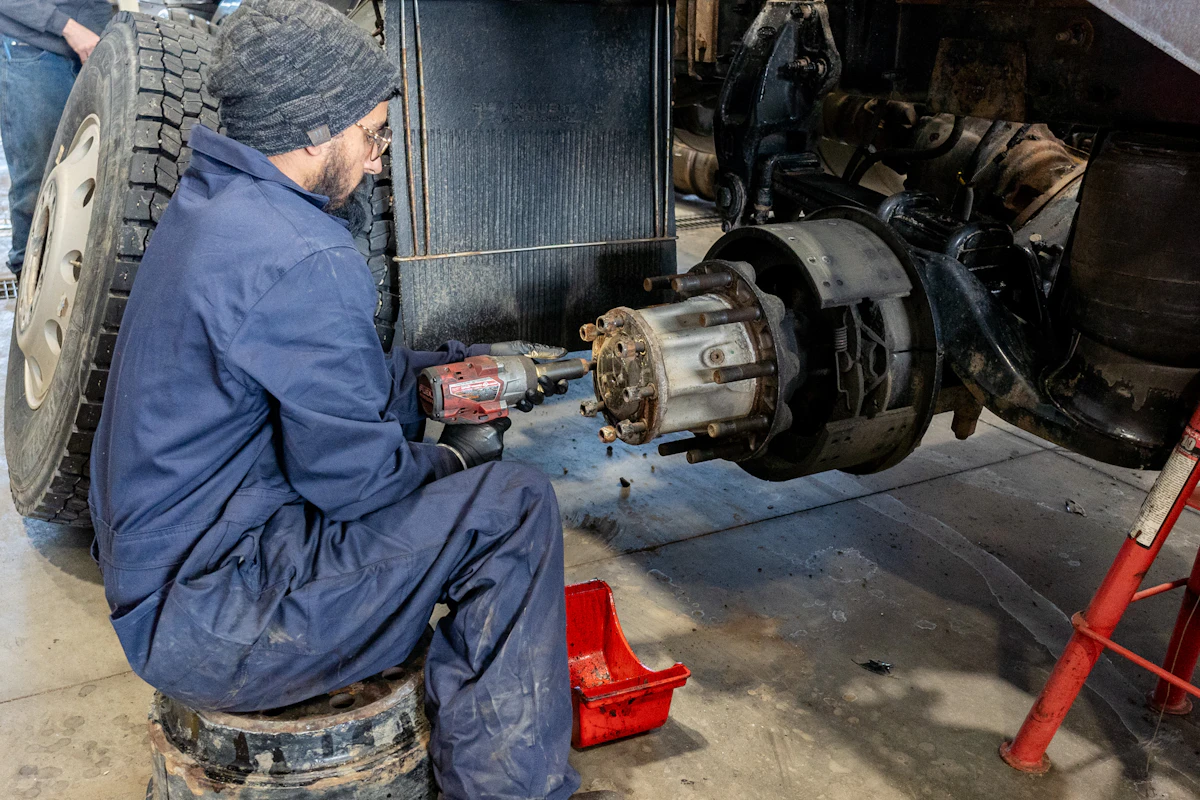 Diesel mechanic performing trailer repair services in Edmonton, AB